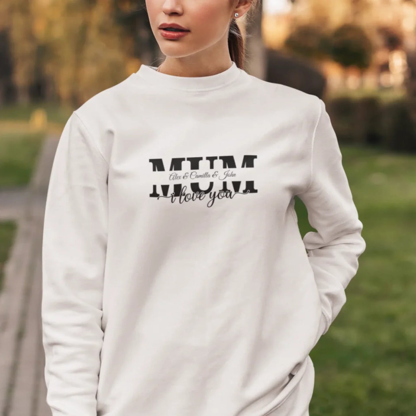crewneck-sweatshirt-of-a-serious-woman-posing-in-a-garden-5294-el1