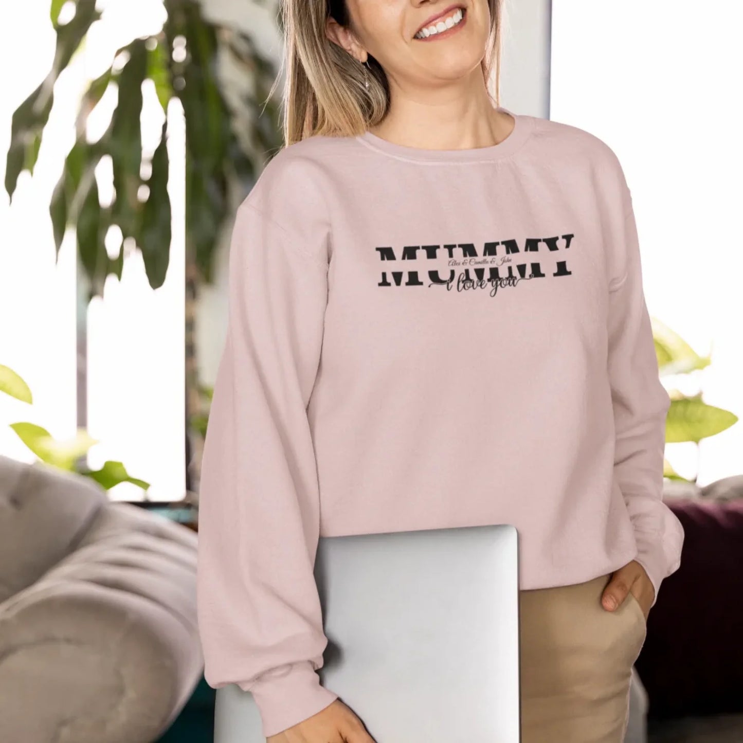 gildan-sweatshirt-mockup-featuring-a-smiling-woman-carrying-a-laptop-m34828